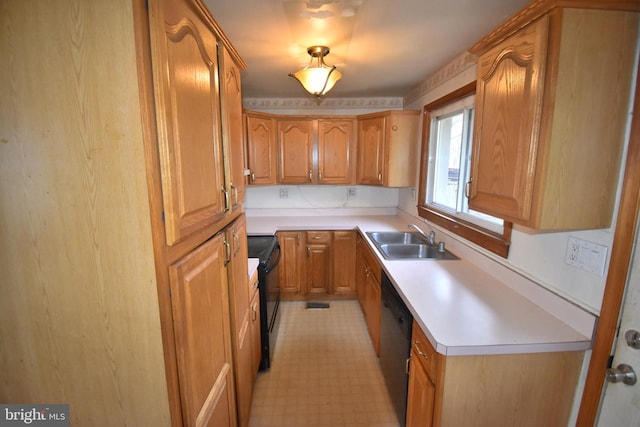 kitchen with black appliances and sink