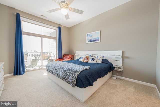 carpeted bedroom with ceiling fan and access to exterior