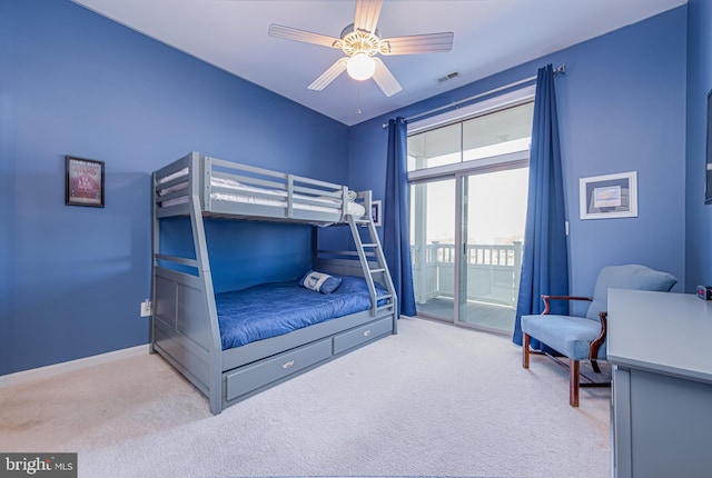 bedroom featuring ceiling fan, access to exterior, and light carpet