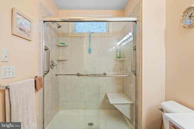 bathroom with vanity and walk in shower