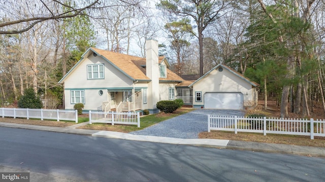 view of front of home with a garage