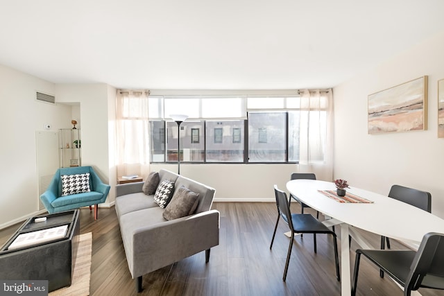 living room with dark hardwood / wood-style floors