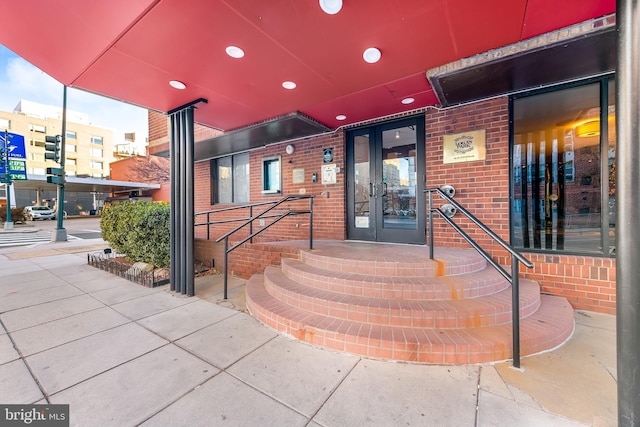 entrance to property featuring french doors