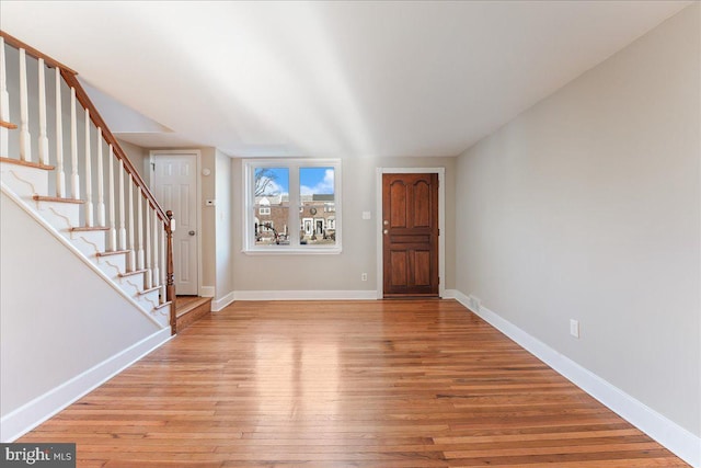 entrance foyer with light hardwood / wood-style flooring