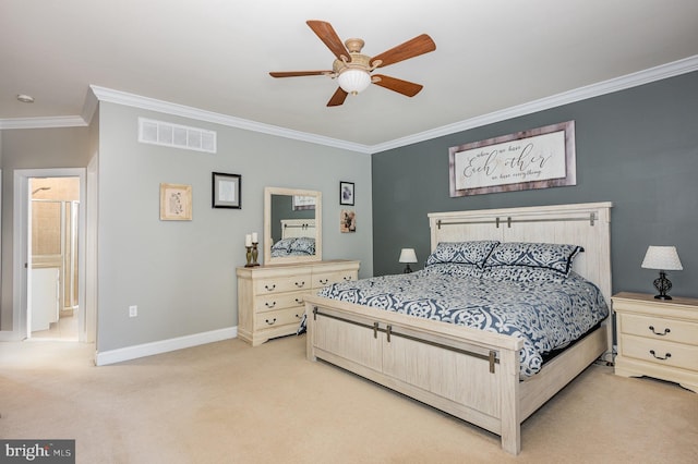 carpeted bedroom featuring ensuite bathroom, ceiling fan, and crown molding