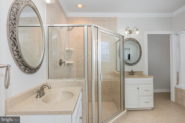 bathroom with tile patterned flooring, crown molding, walk in shower, and vanity