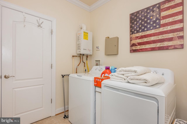 laundry room with washer and dryer, tankless water heater, ornamental molding, and light tile patterned floors