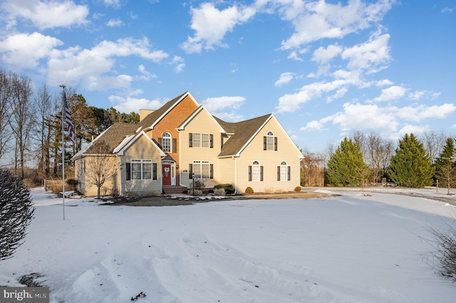 view of snow covered property