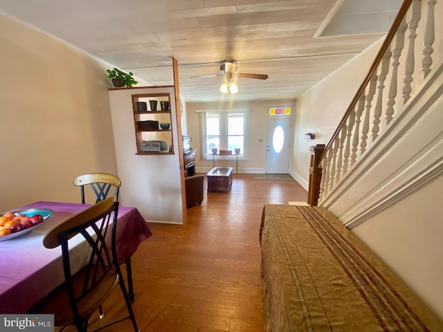 entryway with hardwood / wood-style floors, wood ceiling, and ceiling fan