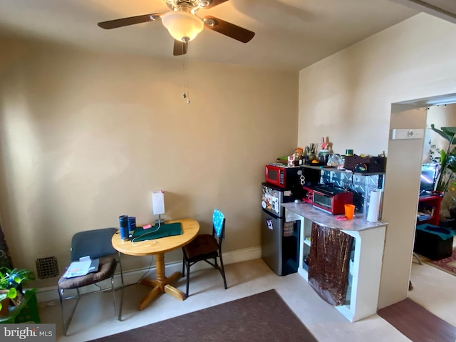 interior space featuring ceiling fan