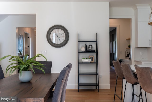 dining area with light wood-type flooring