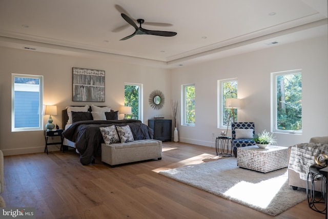 bedroom with hardwood / wood-style flooring and ceiling fan