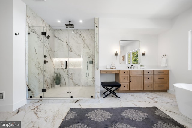 bathroom featuring vanity and plus walk in shower