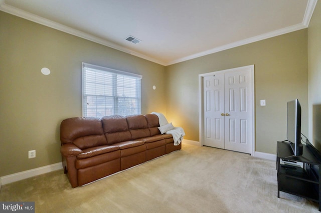 carpeted living room with ornamental molding