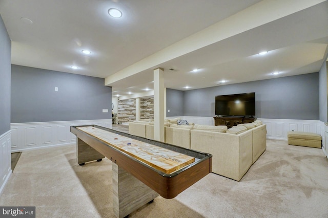 game room with light colored carpet