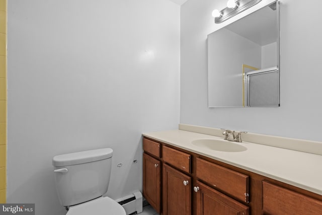 bathroom featuring baseboard heating, toilet, vanity, and an enclosed shower