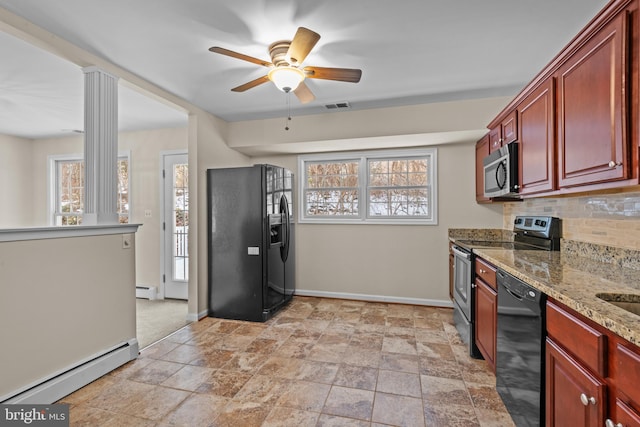 kitchen with a baseboard heating unit, light stone counters, tasteful backsplash, and black appliances