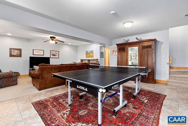 game room featuring ceiling fan and light tile patterned flooring