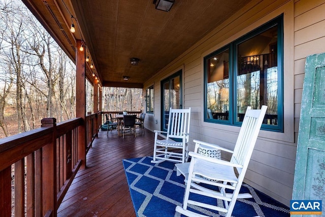 wooden deck featuring a porch