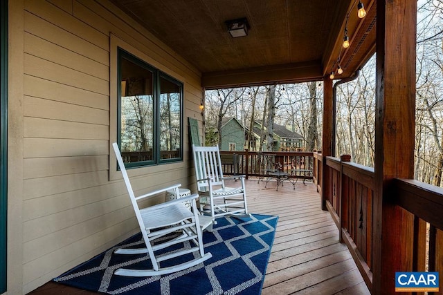 deck featuring covered porch