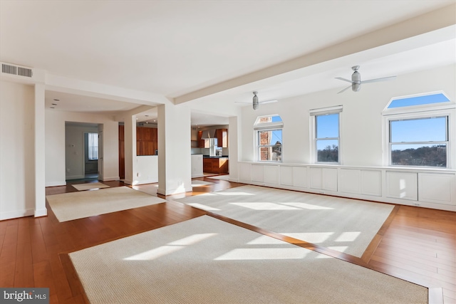 unfurnished room featuring ceiling fan and wood-type flooring