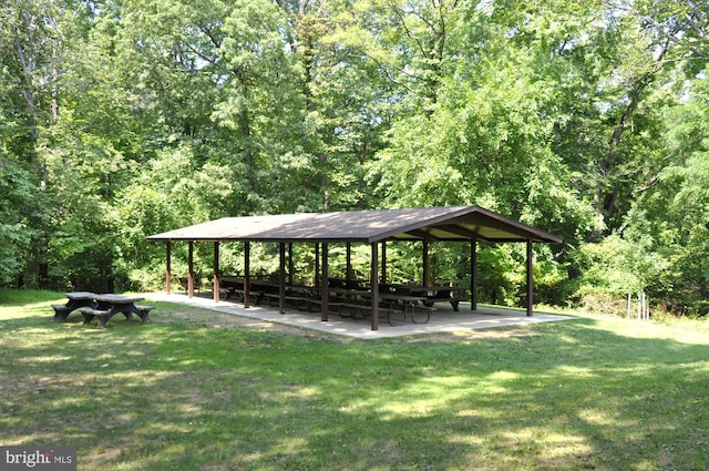 view of property's community featuring a gazebo and a lawn