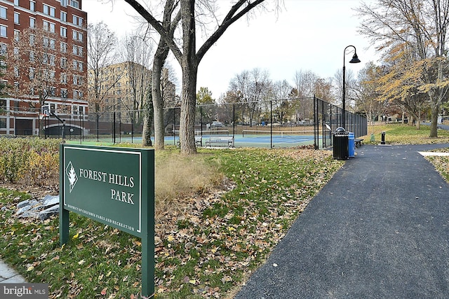 surrounding community with tennis court