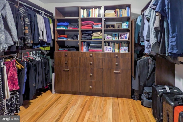 walk in closet featuring light wood-type flooring