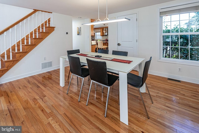 dining room featuring light wood-type flooring