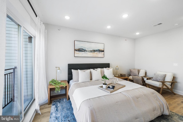 bedroom featuring light wood-type flooring