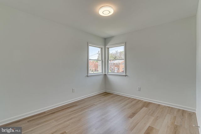 empty room with light wood-type flooring