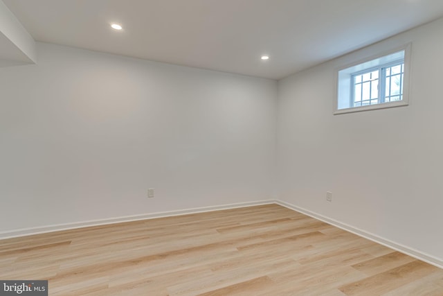 unfurnished room featuring light hardwood / wood-style floors