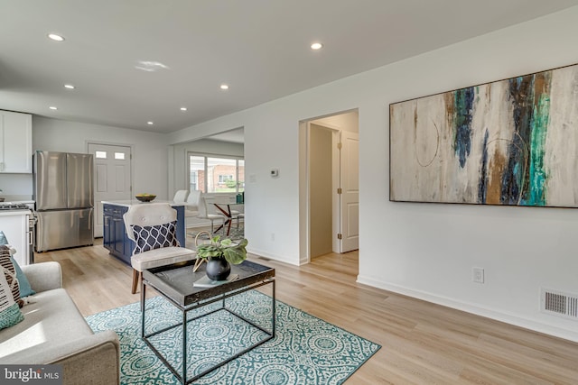 living room with light wood-type flooring