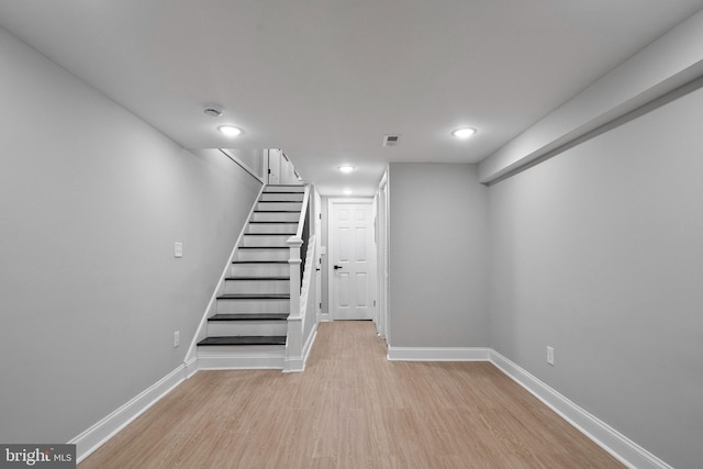 basement with light wood-type flooring