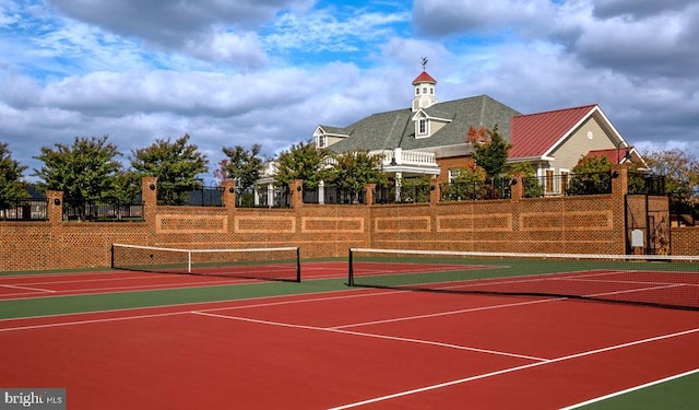 view of sport court featuring basketball hoop