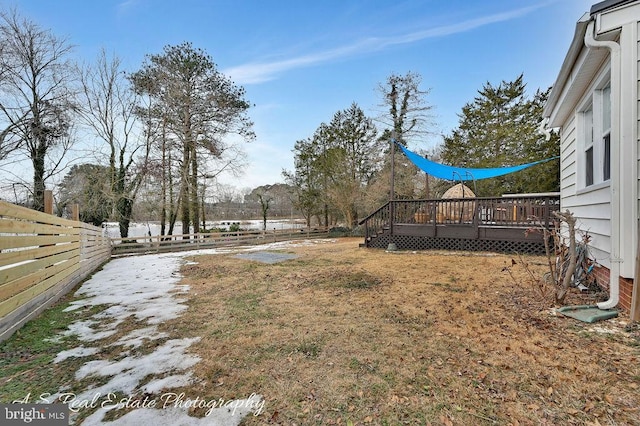 view of yard featuring a wooden deck