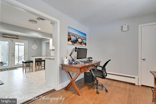 office with a baseboard heating unit and french doors