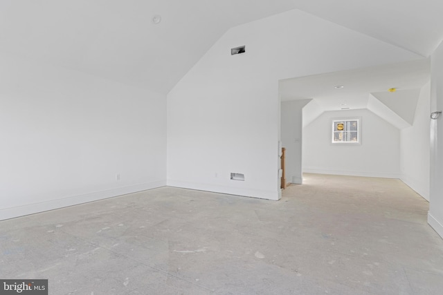 bonus room with vaulted ceiling