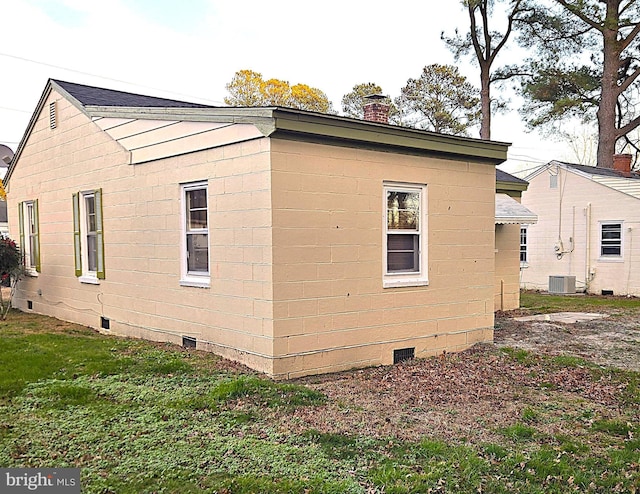 view of home's exterior featuring central AC unit