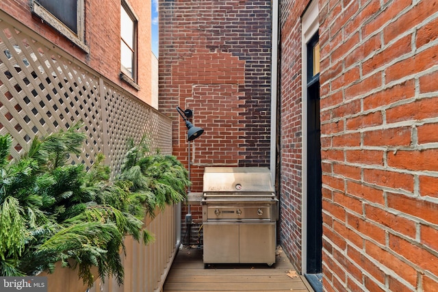 exterior space with a grill