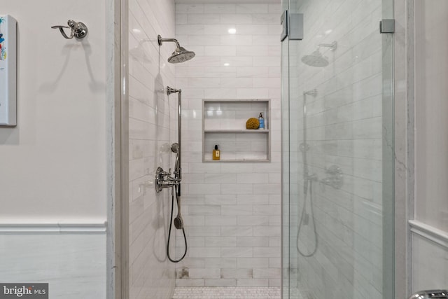 bathroom featuring a shower stall