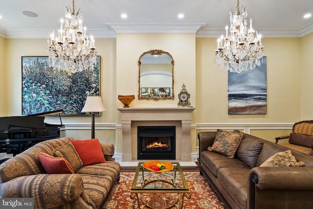 living area featuring a lit fireplace, a chandelier, crown molding, and recessed lighting