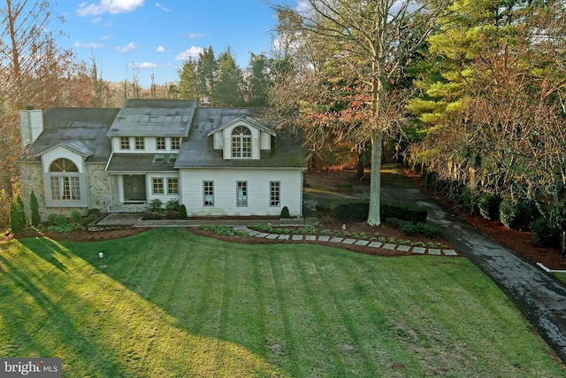 exterior space with a front yard