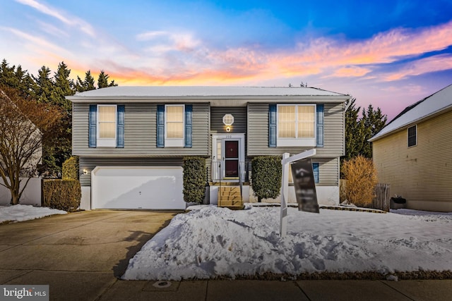 raised ranch with a garage