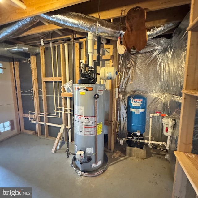 utility room with water heater