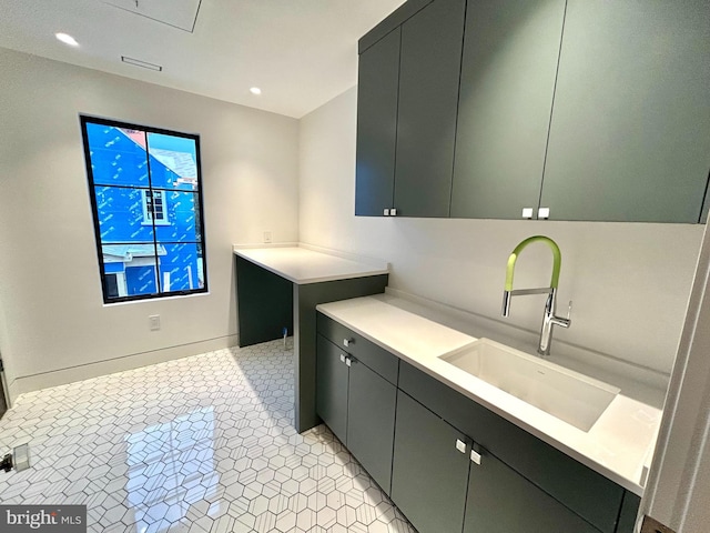 laundry area featuring sink