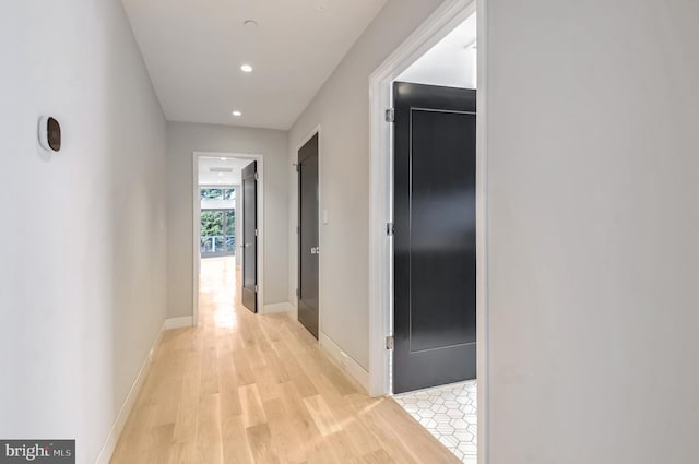 hallway featuring light hardwood / wood-style flooring