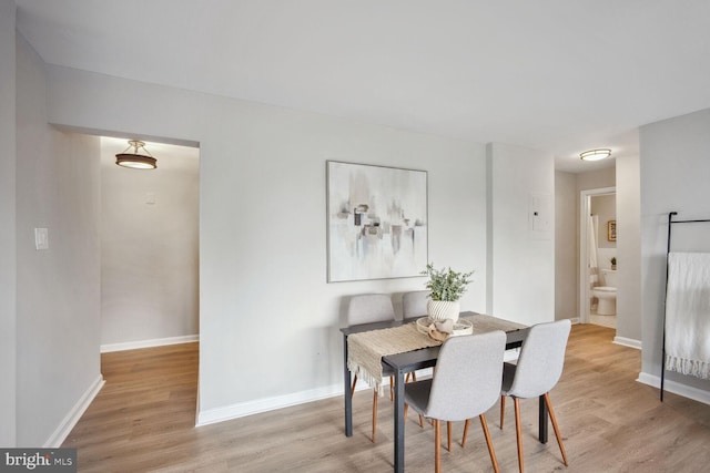 dining room featuring light hardwood / wood-style floors