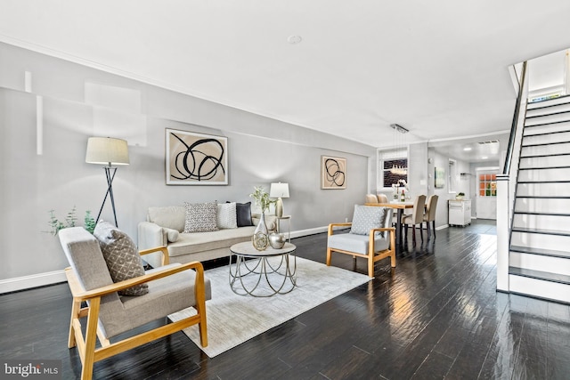 living room featuring dark hardwood / wood-style floors