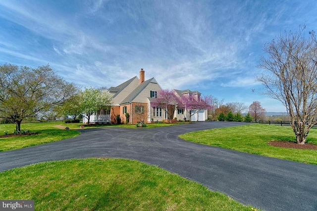 view of front of home with a front yard